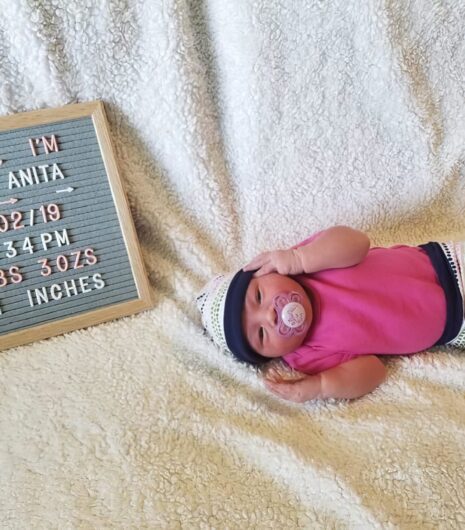 Newborn in handmade outfit