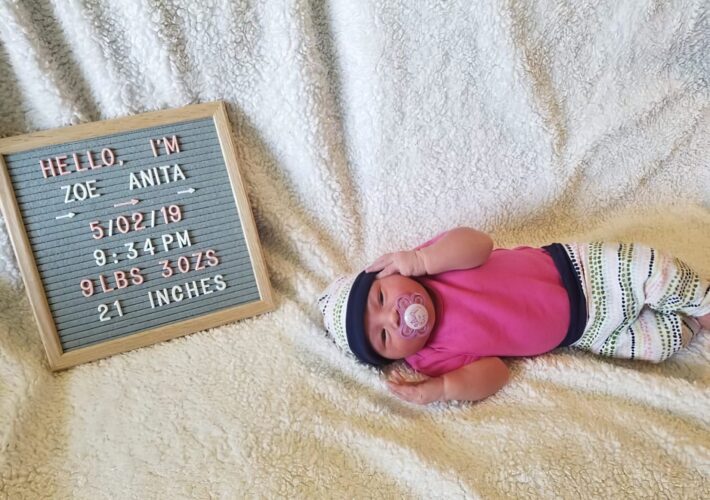 Newborn in handmade outfit