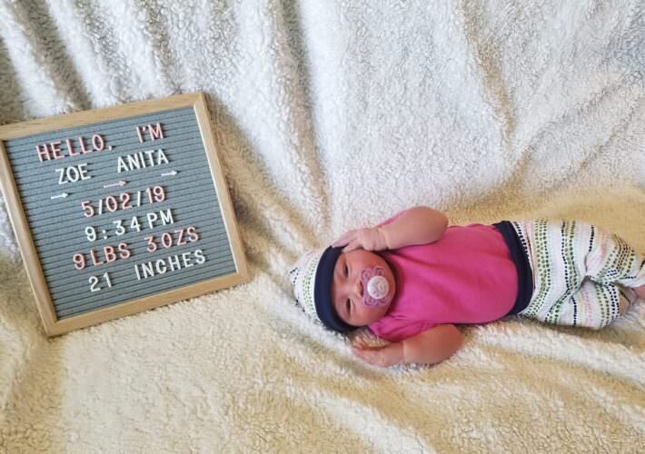 Newborn in handmade outfit