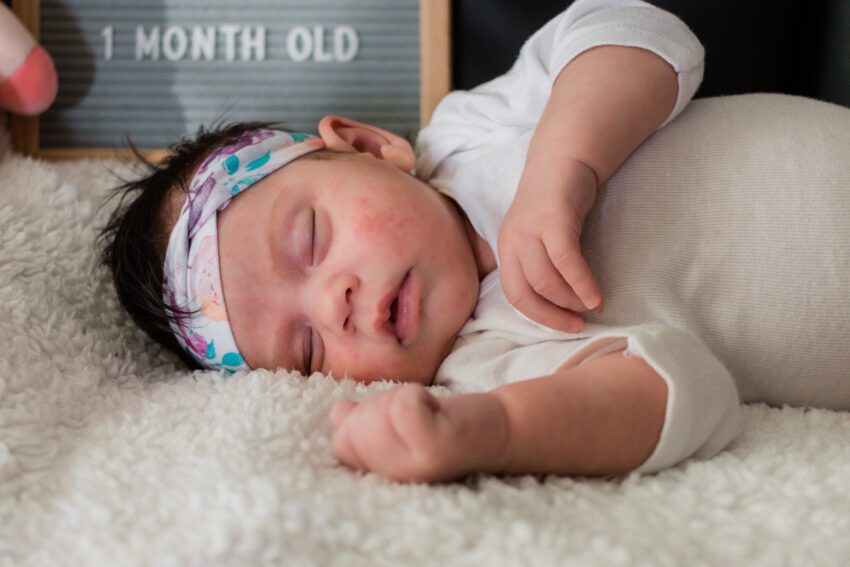 Closeup of baby with floral headband