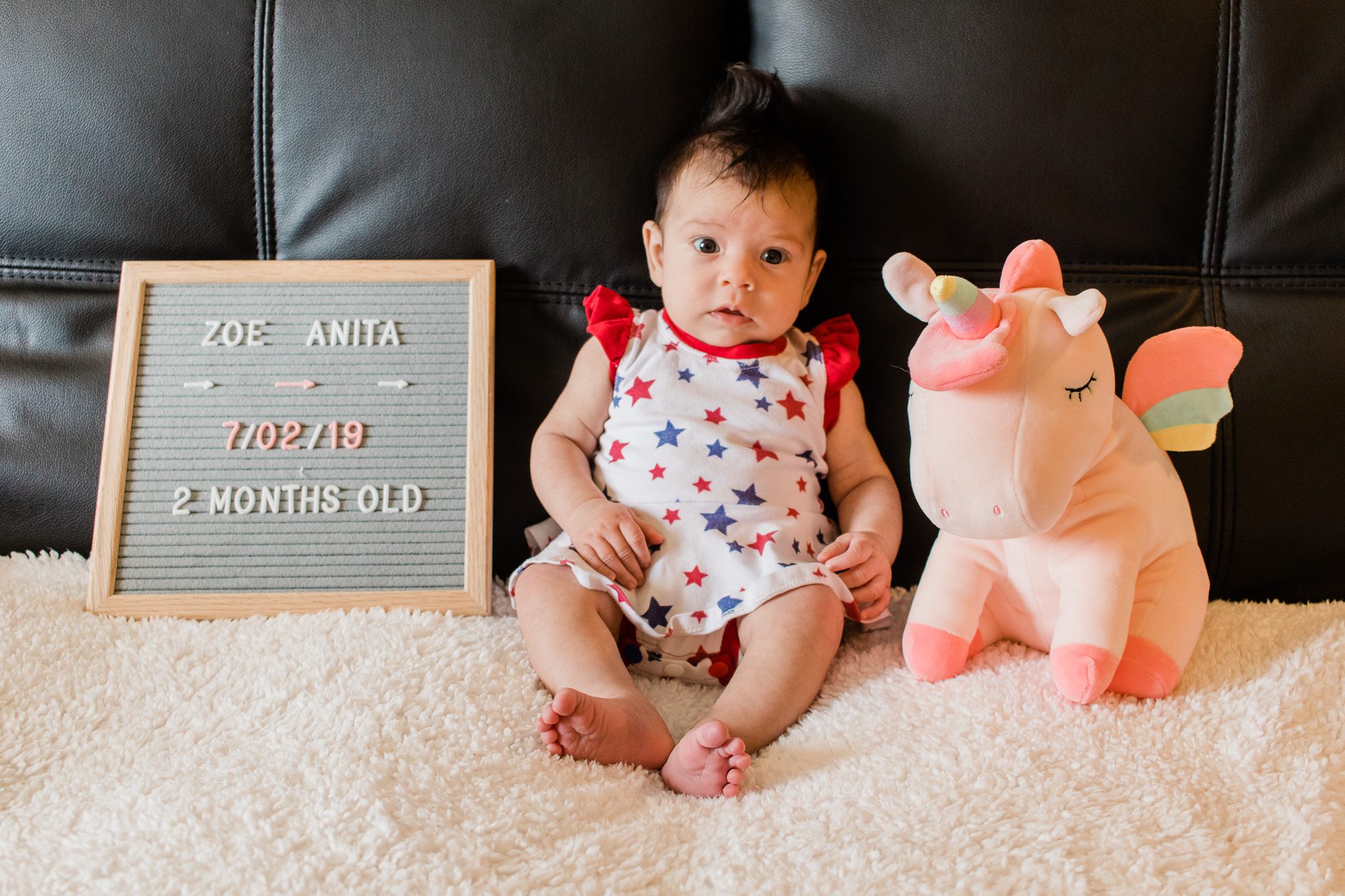 Baby in a star spangled outfit